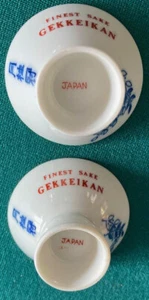 VINTAGE & ORIGINALE~~DUE TAZZE~~GEKKEIKAN~~FINEST SAKE ~~GIAPPONE~~APPLAUSI~CERCHI ORO - Foto 1 di 2