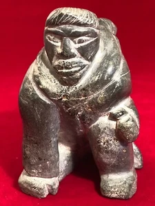 Vintage Signed Native American Inuit Eskimo Soapstone Carving Man and Seal - Picture 1 of 10
