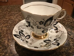 Tazza da tè e piattino Bone Windsor Bone China nero con fiori oro made in England come nuovo - Foto 1 di 8