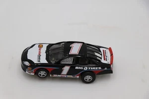 Auto World NASCAR Big Tires Service Central #1 HO Slot Car Funzionante - Foto 1 di 6
