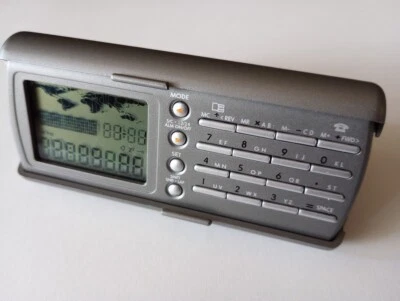 RELOJ DE VIAJE ALARMA FECHA PORTÁTIL BOLSILLO PLEGABLE Foto 1 de 4