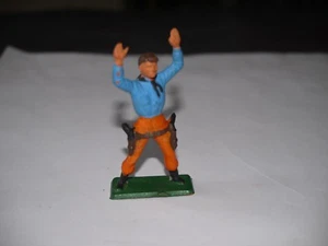 FIGURINE STARLUX COW-BOY BLEU ET ORANGE 2 PISTOLETS BRAS LEVÉS - Picture 1 of 2