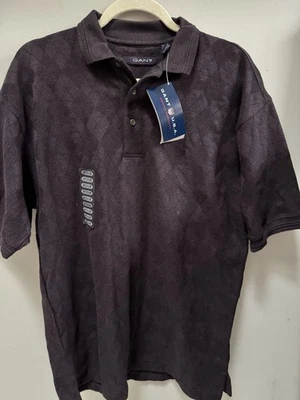 Polo texturizado Gant para hombre talla mediana agujero negro en uno 100 % algodón nuevo con etiquetas Foto 1 de 4