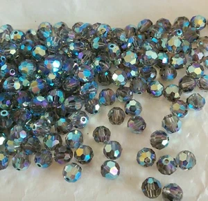 Swarovski 5000 6mm Round beads, Black Diamond AB2X (12pcs) - Picture 1 of 4