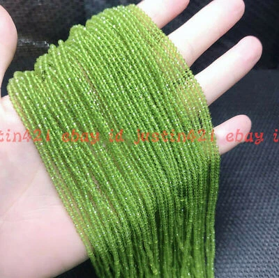 Wholesale 10 Strand Natural 2mm Round Faceted Green Peridot Gemstone Loose Beads - Image 1 of 4