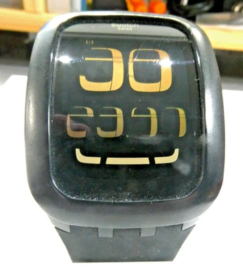 Un Reloj Táctil Digital Swatch 2011 Raro SURB100 SWATCH TOUCH Caja Negra Nuevo Batt Foto 1 de 4