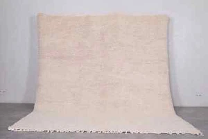 Handmade Moroccan Beni Ourain Wool Rug | Minimalist Solid Beige Design - Picture 1 of 6