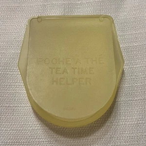 Exprimidor de bolsa auxiliar Tupperware Tea Time vintage - amarillo claro - Imagen 1 de 2