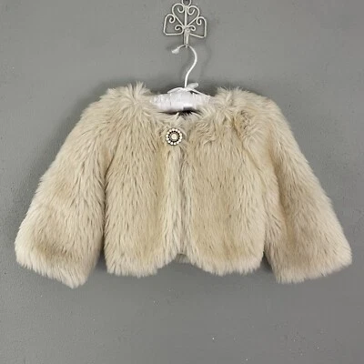 Chaqueta de piel sintética Baby Gap para niñas talla M/L beige manga larga Topper vacaciones invierno Foto 1 de 4