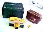 Golden Ricoh "16" camera w/cases (bx 128)