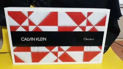 Juego de caja de regalo roja Calvin Klein Obsession Foto 1 de 4