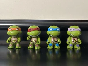 ninja turtle big head toys. Accessories Not Included.  - Picture 1 of 2