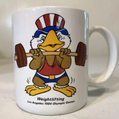 Vintage Weightlifting Coffee Mug 1984 Los Angeles Sam the Olympic Eagle Papel  - Image 1 of 4