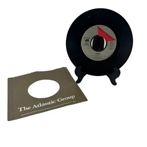 45 rpm record Foreigner Girl on the moon / urgent vinyl single - Imagen 1 de 3
