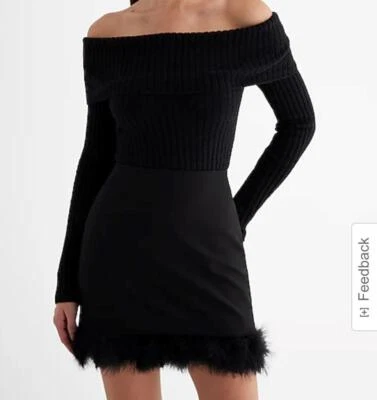 nueva minifalda de cintura alta con ribete de piel favorita de instagram EXPRESS 8 m Foto 1 de 2