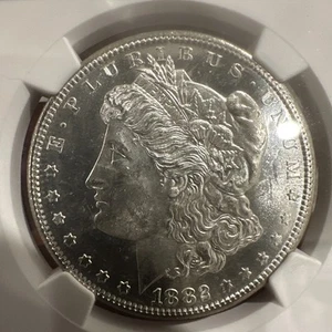 1882 S Morgan Silver Dollar NGC MS 63 - Picture 1 of 5