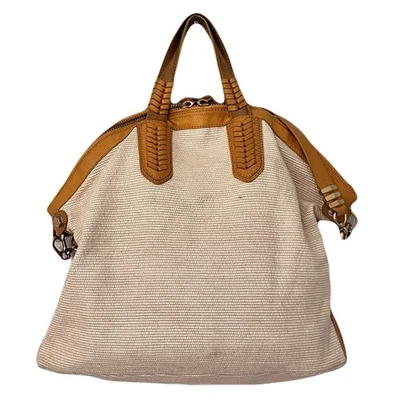 Cartera OrYany beige y amarillo tejida en dos tonos, tapizada en cuero Foto 1 de 4