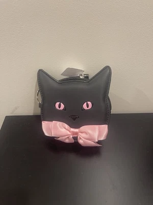Cartera Bath & Body Works gato negro con ojos rosas y pajarita rosa  Foto 1 de 4
