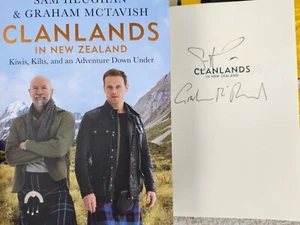 SIGNED Graham McTavish & Sam Heughan AUTOGRAPHED Book Clanlands in New Zealand - Picture 1 of 2