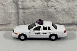 *NEW* Welly Diecast Car 1999 Ford Crown Victoria Police Red/Blue Light Bar 4.75” - Picture 1 of 6