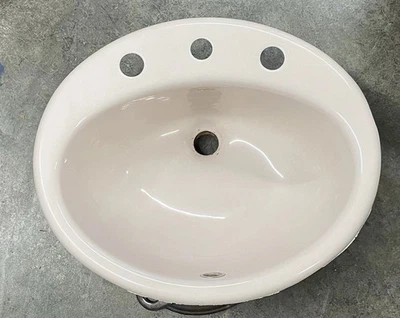 Fregadero de baño ovalado de hierro fundido rosa claro Kohler UPC K-2904, con desbordamiento Foto 1 de 4