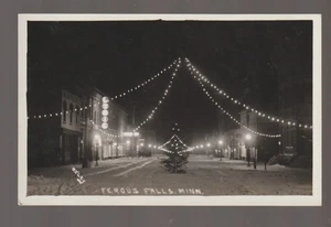 Fergus Falls MINNESOTA RPPC c1915 CHRISTMAS LIGHTS Night Shot TREE Main OXLEY MN - Picture 1 of 2