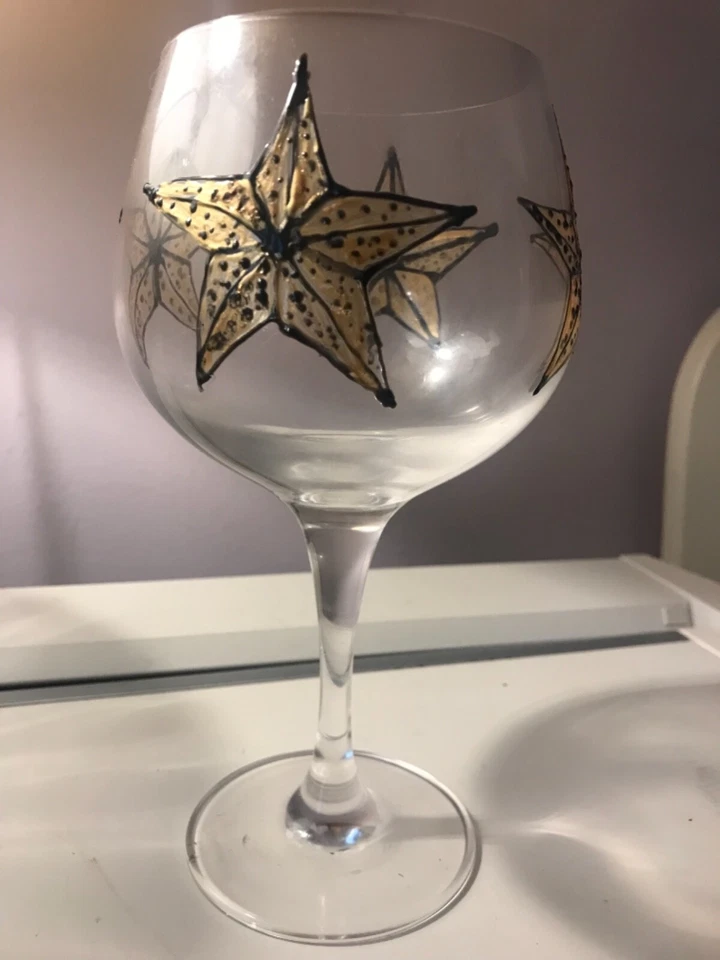 Hand painted black and gold star gin glass. Dishwasher  safe  - Image 1 of 4