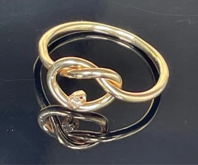 ELEGANTE ANILLO NUDO ORO AMARILLO 14K Y DIAMANTES TALLA 7 Foto 1 de 4