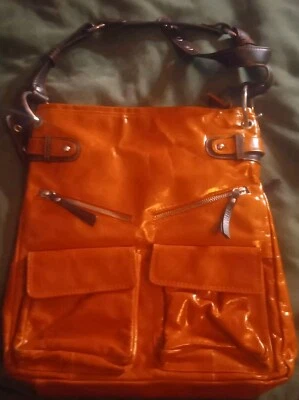 Bolso de hombro HOBO de cuero genuino Nino Bossi bolso de mano caramelo con bolsillos cremallera  Foto 1 de 4