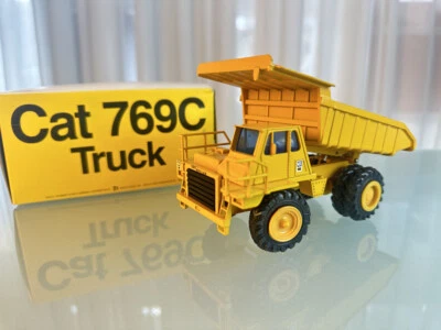 Camion Caterpillar CAT 769C scala 1:50 ottime condizioni con scatola originale - Immagine 1 di 4