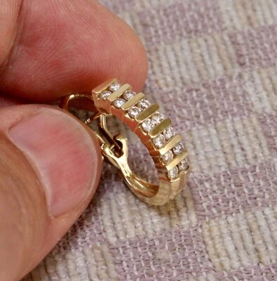 SINGLE 14K YELLOW GOLD HALF CARAT CHANNEL SET HUGGIE HOOP EARRING  - Image 1 of 4