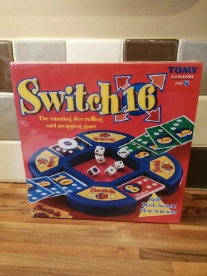 Juego Tomy Switch 16 2003. *NUEVO Y PRECINTADO*. JUEGO DE INTERCAMBIO DE CARTAS CON DADOS. Foto 1 de 4