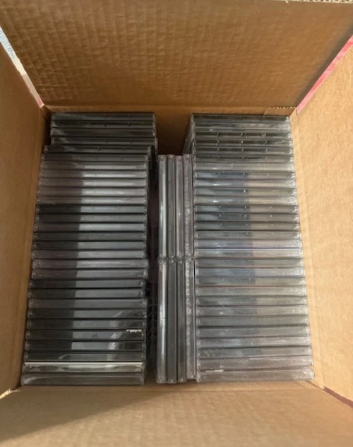 Case of 70 Blank Pre-Owned Standard CD Jewel Cases Mix of Black and Clear - Image 1 of 1