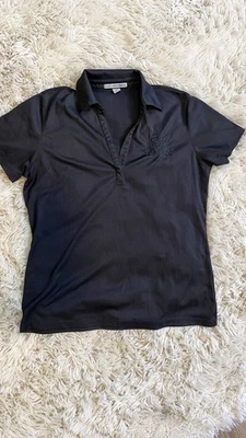 Polo Toyota Dri Fitwomen’s uniforme de empleado gris grande concesionario de automóviles Foto 1 de 4