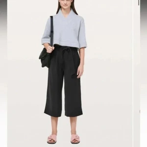 Lululemon Women’s Noir Crop Pant flowy office comfy minimalist pockets - Picture 1 of 14