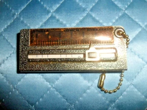 unusual brass weight management key chain - Volupte? - Picture 1 of 7