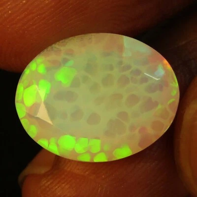 5.11Cts Natural Color Play White Opal 15.6x12.3x7mm Oval Faceted Loose Gemstone - Image 1 of 4
