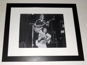 Framed AC/DC Bon Scott, Angus Young on shoulders, 1979 On Stage 13" by 16" - Picture 1 of 2