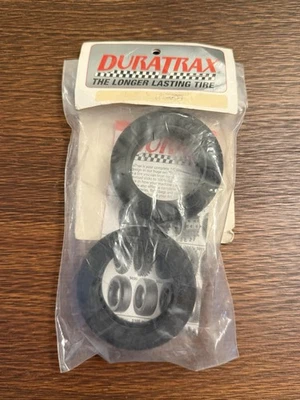 Neumáticos delanteros lisos Duratrax 5030 de colección nuevos en paquete Foto 1 de 2