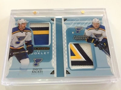 15-16 black diamond hockey-V.Tarasenko/D.Backes double patch booklet 09/10 - Image 1 of 3
