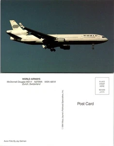 Postal del avión McDonnell Douglas MD-11 World Airways en vuelo, Suiza - Imagen 1 de 1