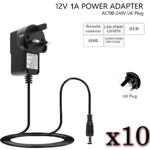 Alimentatore caricabatterie 12 V 1 A DC x10 adattatore alimentatore per telecamera a circuito chiuso striscia LED spina Regno Unito - Foto 1 di 10