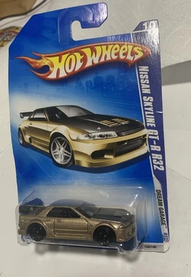 Nissan Skyline R32 GT-R 2009 Dream Garage Hot Wheels en oro oscuro con negro PR5 Foto 1 de 4