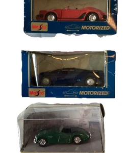 4 Druckguss. 1:43 Dinky Austin Healy, Superior DAF 33, Superior 2 Porsche 911 959 - Bild 1 von 24