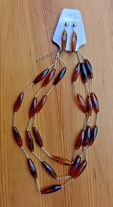 Set 2 pezzi perline finte ambra collana 3 fili e orecchini abbinati 11" grossi - Foto 1 di 7