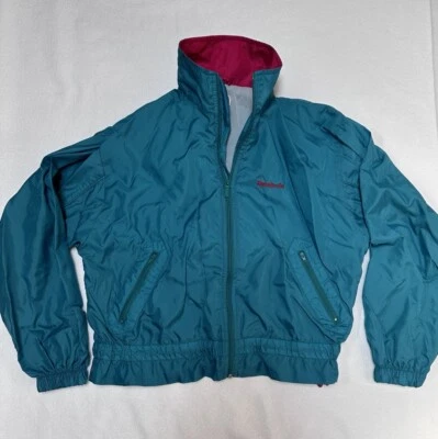 Cortavientos Reebok Y2K vintage años 90 verde azulado y rosa ceñido medio Foto 1 de 4