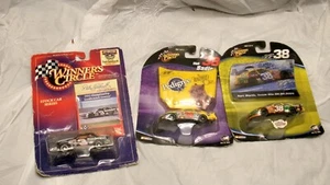 DALE EARNHARDT SR GOODWRENCH 1993 AND ELLIOT SANDLER 2004 WINNERS CIRCLE LOT. - Picture 1 of 4