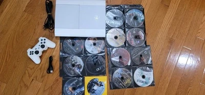 Sony PS3 Super Slim 500GB White Console, 15 games, Matching White Controller - Image 1 of 4