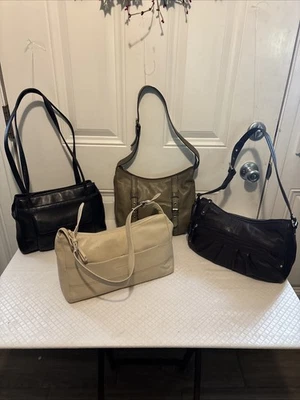 Lote 4 bolsas Stone Mountain usadas negras, marrones, verdes, crema  Foto 1 de 4