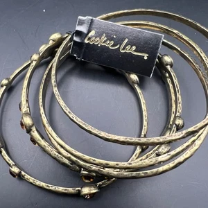 Cookie Lee Bangle Bracelet Set of 7 Gold Tone with Amber Crystals NWT - Picture 1 of 3